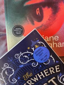 Two books with "advanced reader copy" stickers on the front covers.